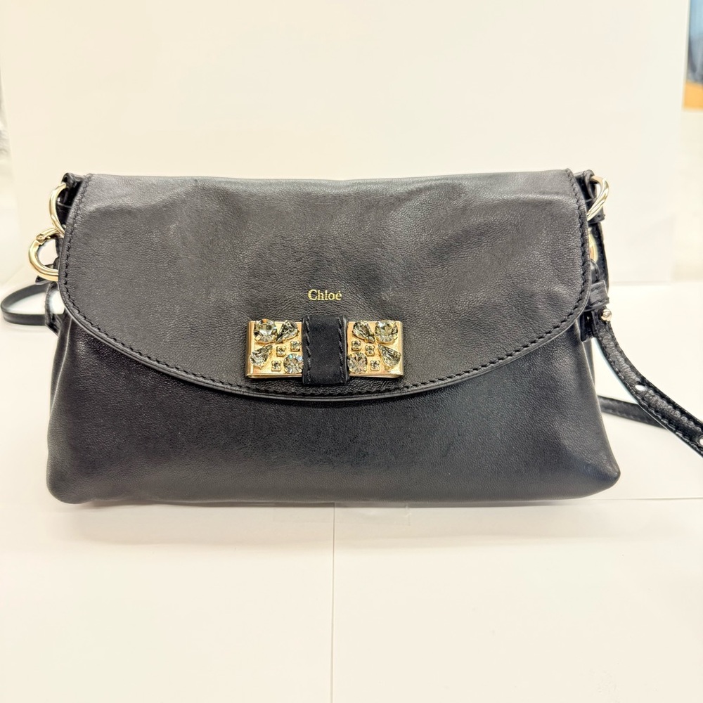 Chloe Authentic Lily Line Black Leather Shoulder bag with a Rhinestone bow.